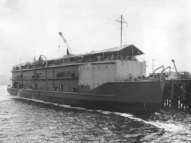 This Auxiliary Personnel Lighter (APL-30) was built by Everett Pacific Shipbuilding and Dry Dock Company in 1944. It was built to serve as a floating barrack ship that could hold 800 servicemen.    
Photo courtesy of Larry and Jack O’Donnell. 
